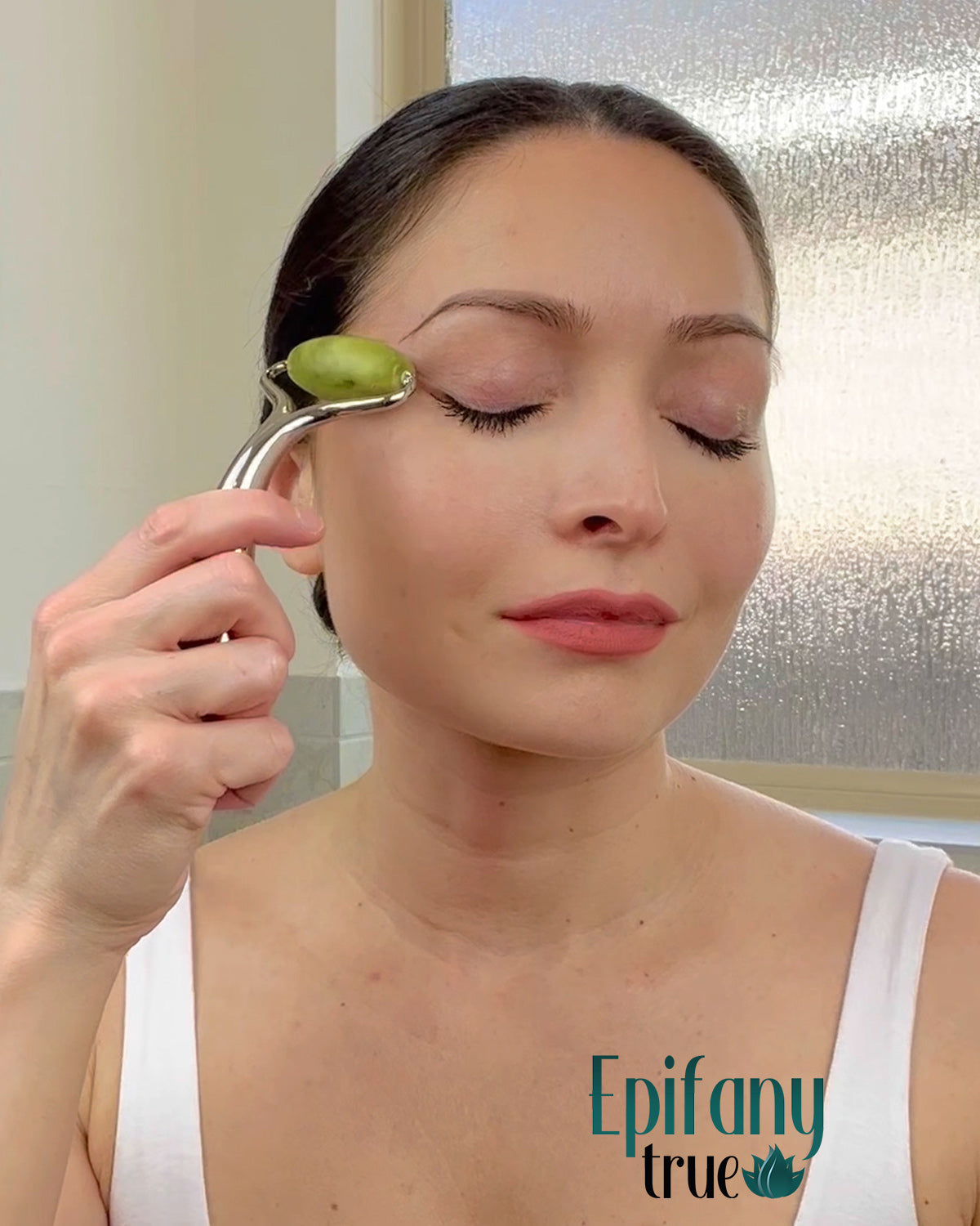 Epifany True Natural Green Jade Face and Body Massage Roller - woman rolling face