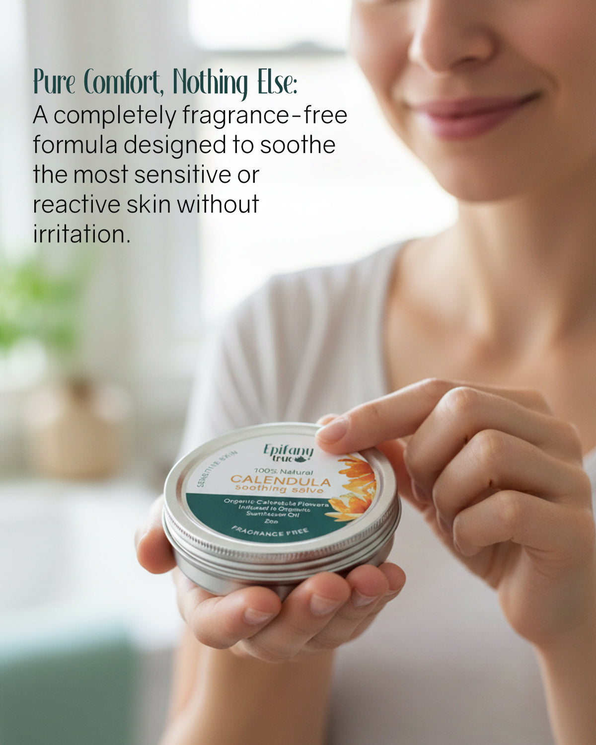Woman holding a container of Epifany any True Fragrance-Free Calendula Soothing salve - pure comfort.