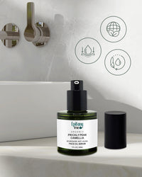 Epifany True Prickly Pear Face Oil open bottle on a bathroom counter with icons indicating ingredients and benefits.